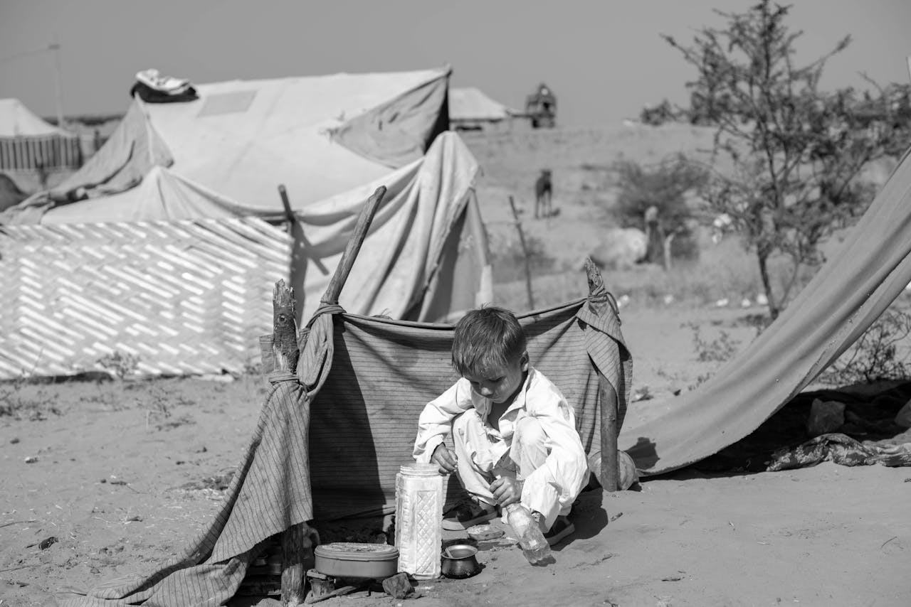 services-04 Kid Playing at a Desert Campsite